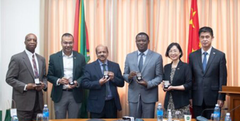 Guyana, China unveil $50 commemorative coin