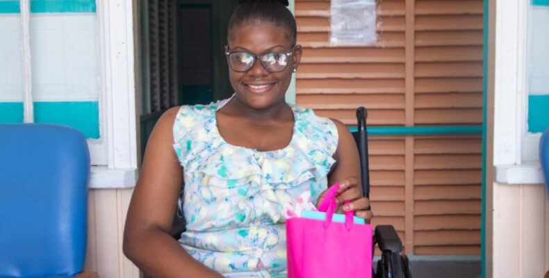 Girl with chronic spinal disorder scores big at CSEC exams